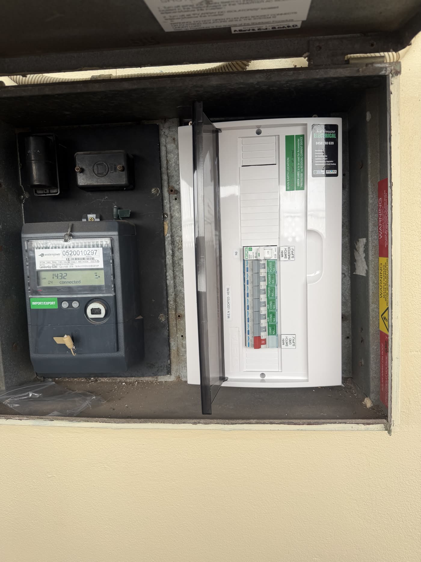 New switchboard with RCBOs, labelled circuits and solar main switch beside the meter
