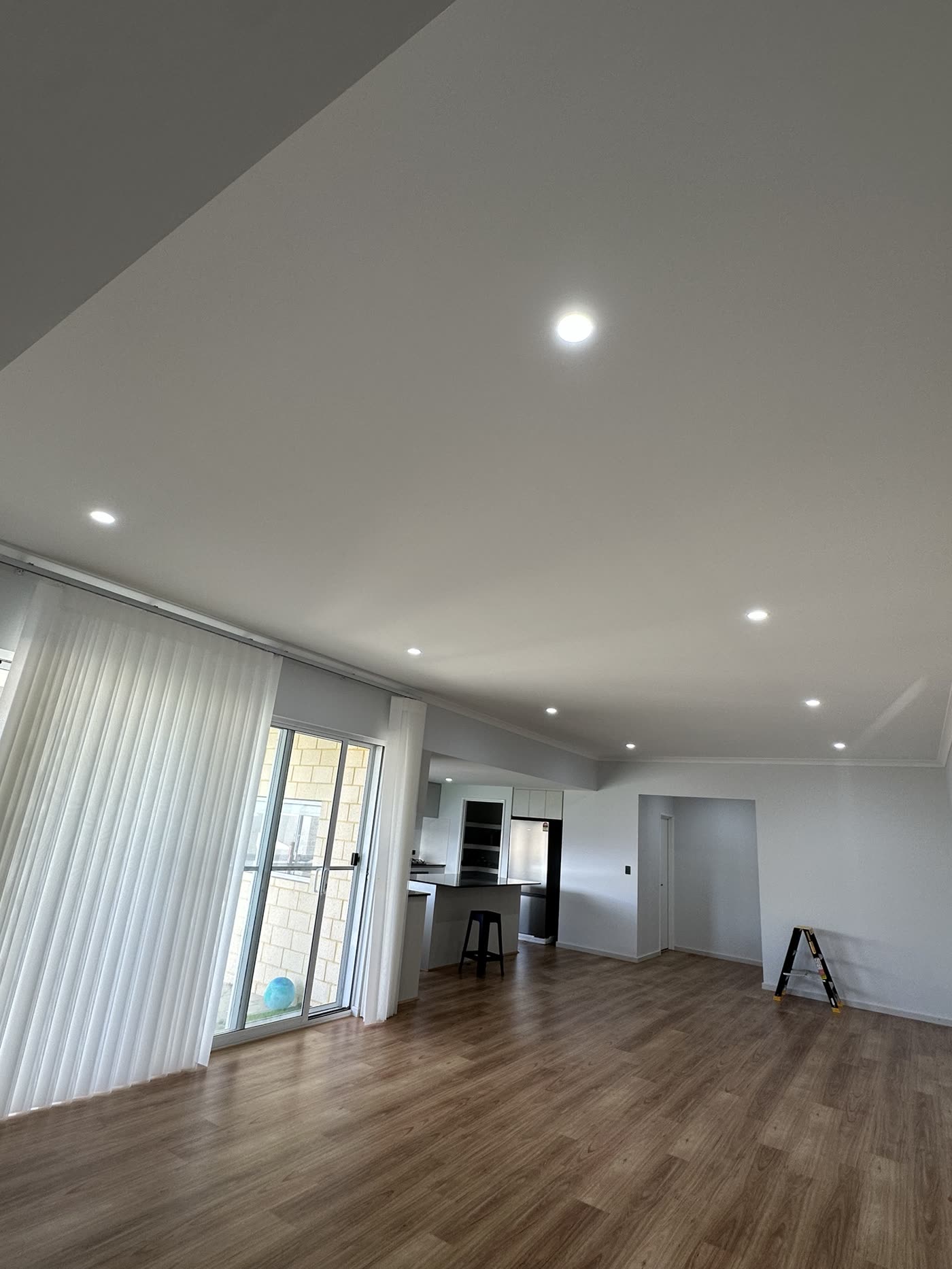 Open-plan living area with LED downlights throughout
